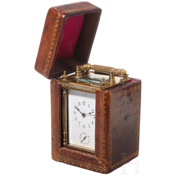 An antique French travelling clock with alarm function, late 19th century