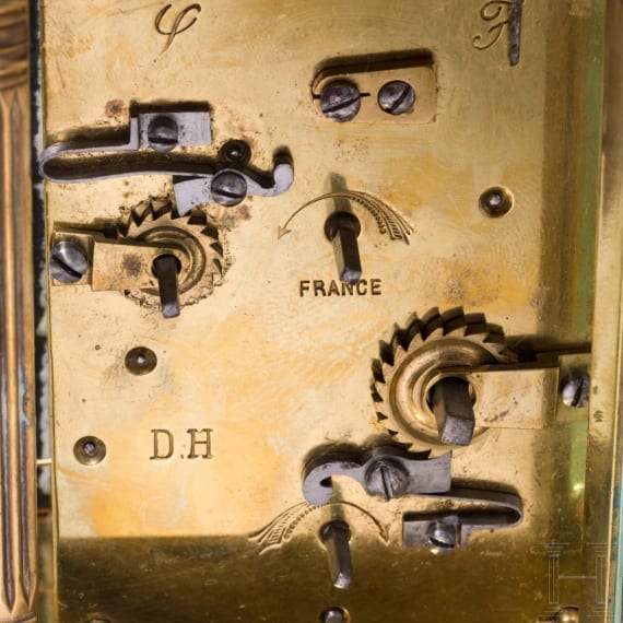 An antique French travelling clock with alarm function, late 19th century