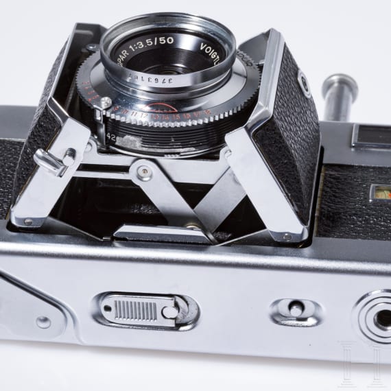 A Voigtl&auml;nder Vitessa rangefinder camera with the ever-ready bag, original box and operating instructions