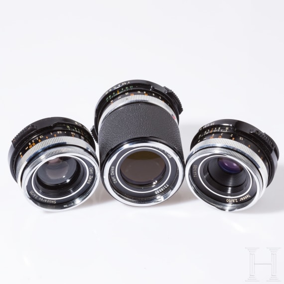 A Zeiss Ikon SL 706 with Carl Zeiss Tessar 50 mm, a Skoparex 35 mm, a Super-Dynarex 135 mm