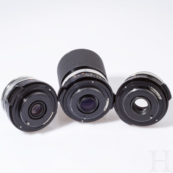 A Zeiss Ikon SL 706 with Carl Zeiss Tessar 50 mm, a Skoparex 35 mm, a Super-Dynarex 135 mm