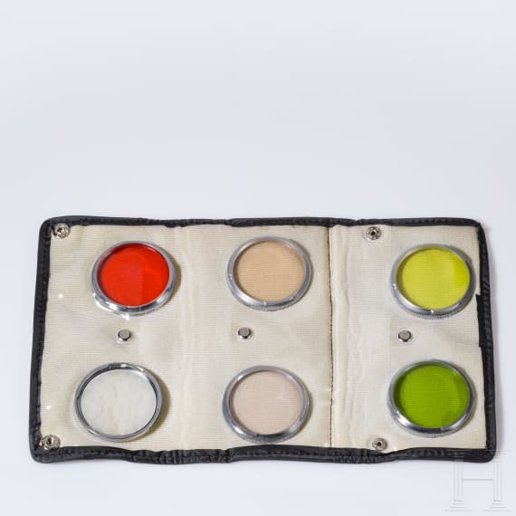 A group of filters and lens hoods from Rollei, Heliopan, Zeiss Ikolor