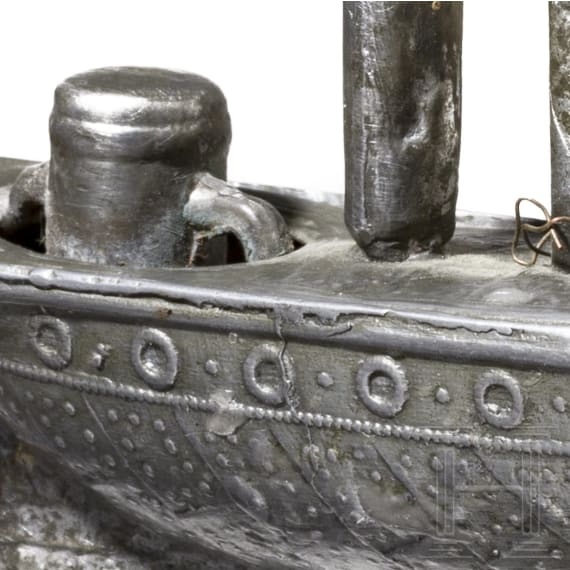 A pewter miniature sailing ship, circa 1840