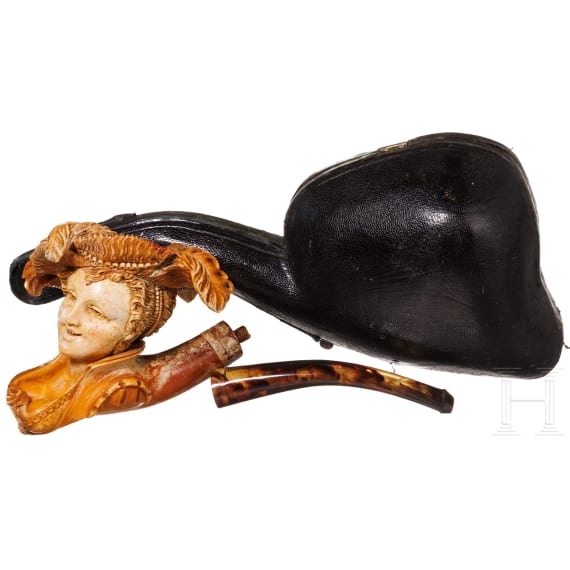 A carved Russian figural meerschaum pipe, St. Petersburg, late 19th century