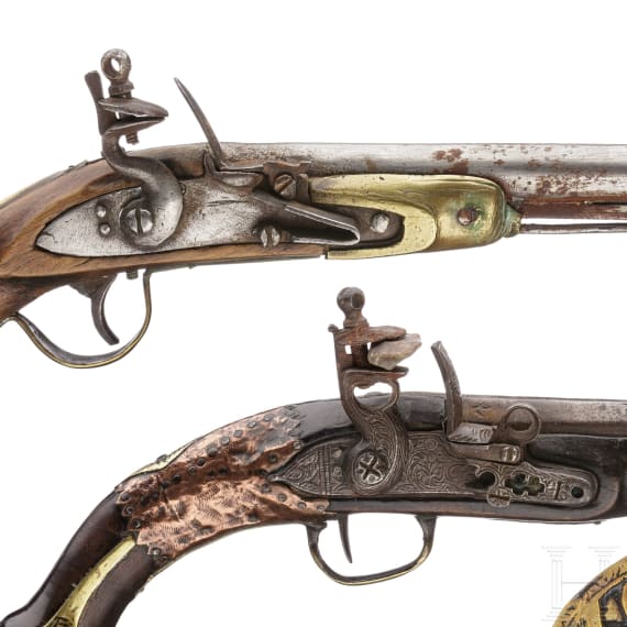 Two Moroccan flintlock pistols and a powder flask, 19th./20th century