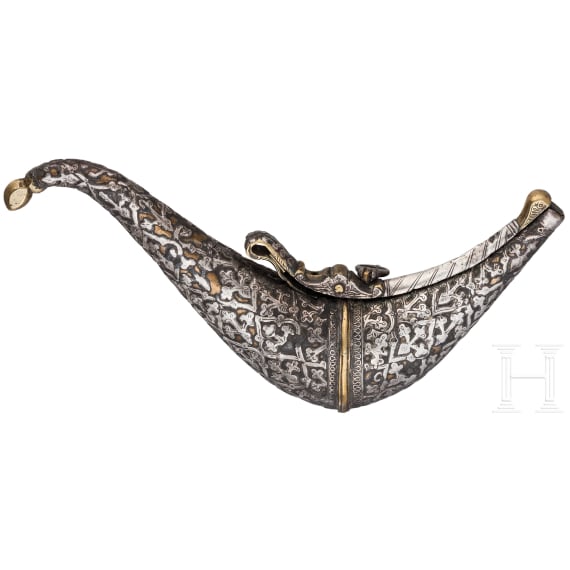 A silver decorated Indian powder flask, 19th century