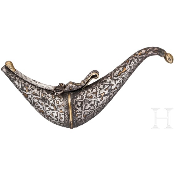 A silver decorated Indian powder flask, 19th century