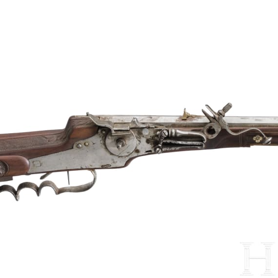 A wheellock rifle, collector's replica in 17th century style using some old parts