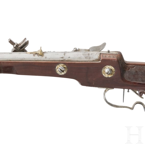 A wheellock rifle, collector's replica in 17th century style using some old parts