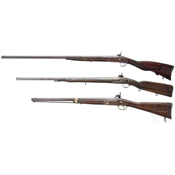 Three percussion flintlocks, 19th century
