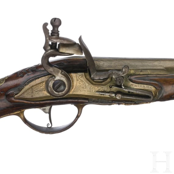 A Belgian flintlock pistol with brass barrel, Thiermay in Li&egrave;ge, circa 1740