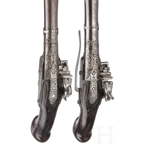 A pair of chiselled Eibar luxury-miquelet-pistols, circa 1760