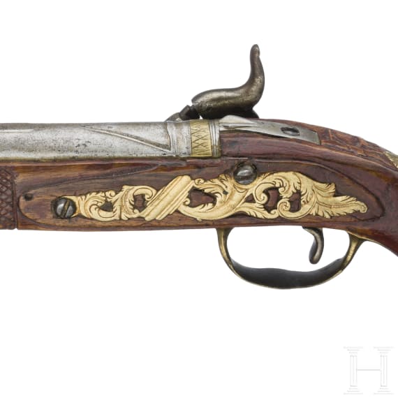 A percussion pistol by Kuchenreuter, circa 1780, and a percussion pistol as a collector's item made using old parts