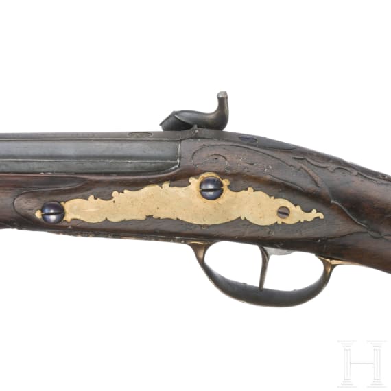 A percussion pistol by Kuchenreuter, circa 1780, and a percussion pistol as a collector's item made using old parts