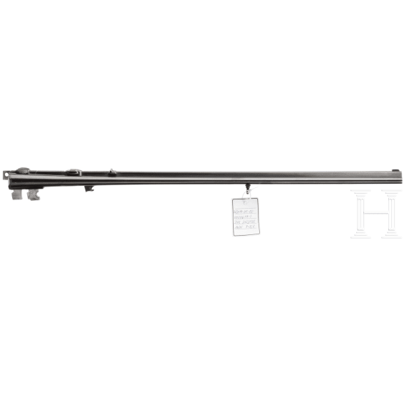A side by side combination gun with extra side by side shotgun barrel in case