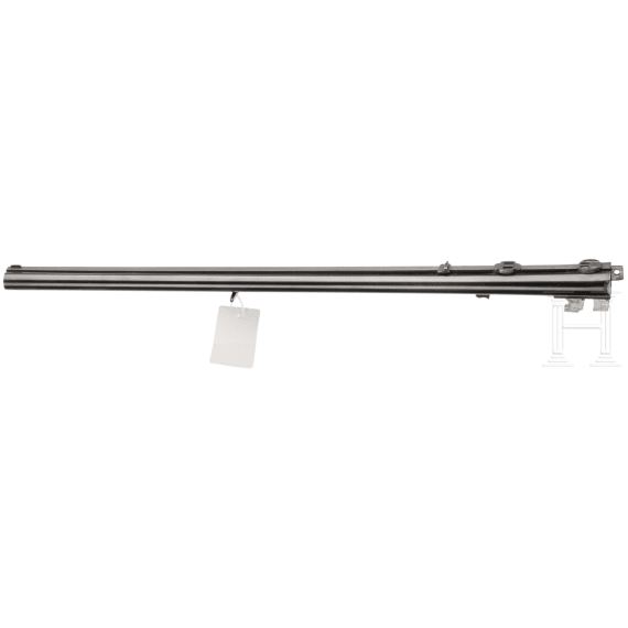 A side by side combination gun with extra side by side shotgun barrel in case