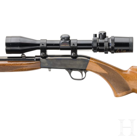 A self loading rifle FN Auto 22 with Hakko scope