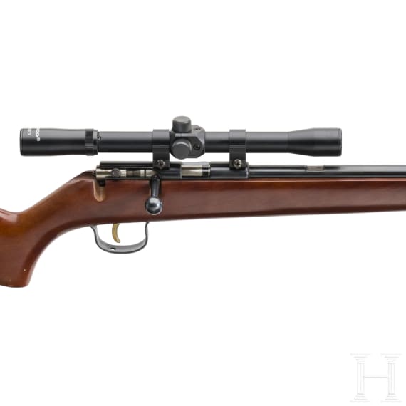 A single shot rifle Voere with scope Tasco