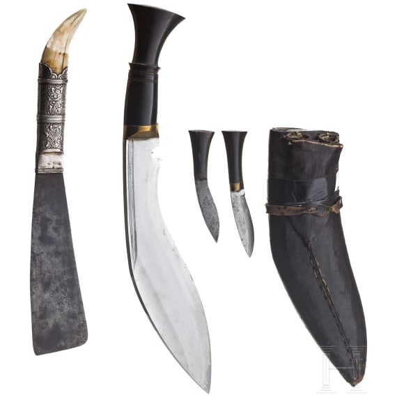 An Indian kukri and a Philippine silver-mounted bolo, 20th century
