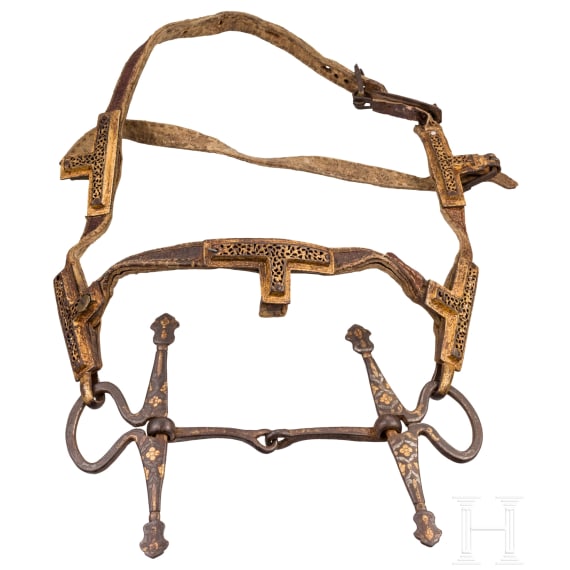 A chiselled Tibetan snaffle with silver and gold inlays, 18th century