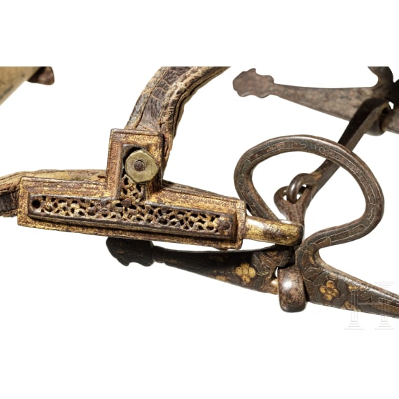 A chiselled Tibetan snaffle with silver and gold inlays, 18th century