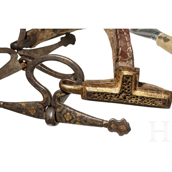 A chiselled Tibetan snaffle with silver and gold inlays, 18th century