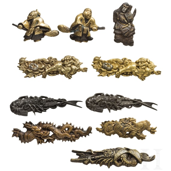 Three pairs of Japanese menuki, 19th and 20th century