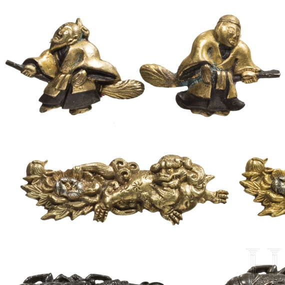 Three pairs of Japanese menuki, 19th and 20th century