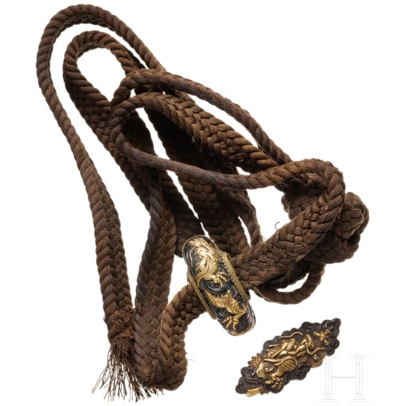 A Japanese kurigata and a single menuki, late Edo period