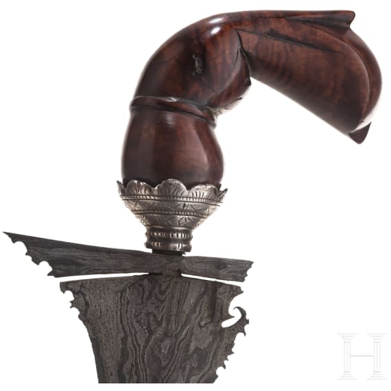 An Indonesian Sulawesi keris with embossed silver scabbard, 20th century