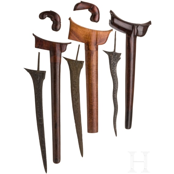 Three Indonesian kris blades and two handles, Sumatra-Palembang and Bali-Tengah, probably 20th century