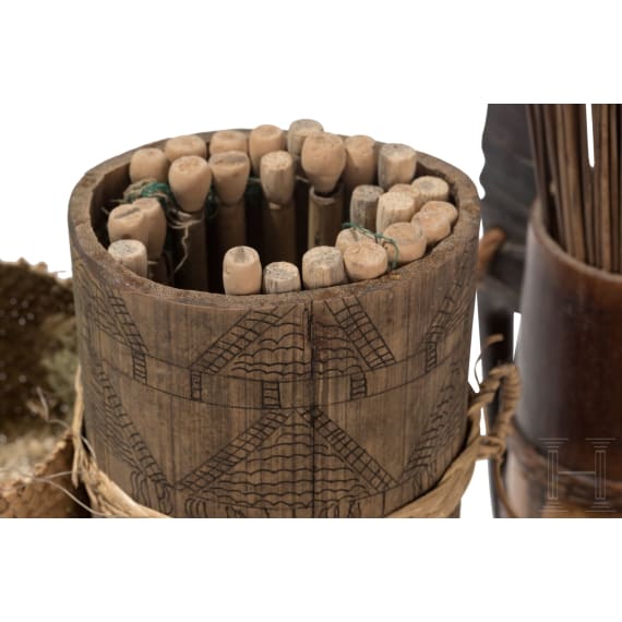 Six Bornean quivers with blowgun arrows