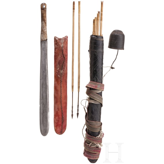 An Indonesian quiver with arrows and a Kenyian slashing sword of the Massai, 20th century