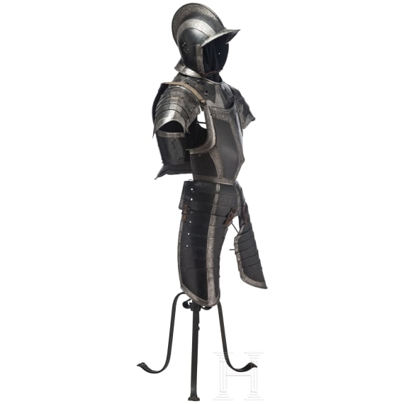 A South German black and white half armour with etched bands for a man-at-arms, circa 1560