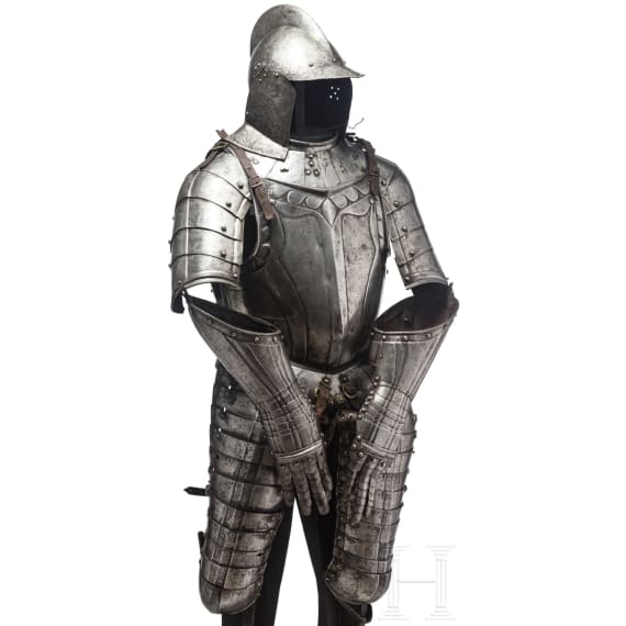 A suit of black and white cavalry armour, assembled from old components, Nuremberg, circa 1560 - 1600