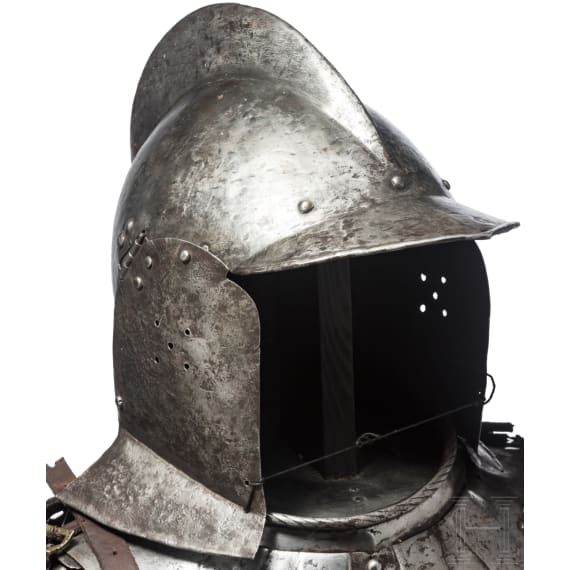 A suit of black and white cavalry armour, assembled from old components, Nuremberg, circa 1560 - 1600