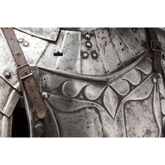 A suit of black and white cavalry armour, assembled from old components, Nuremberg, circa 1560 - 1600