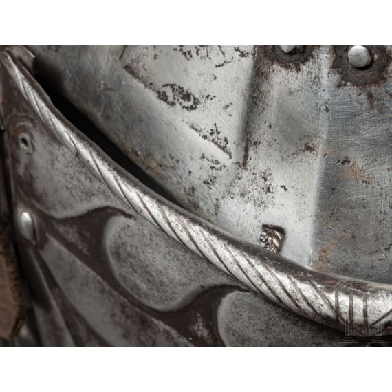 A suit of black and white cavalry armour, assembled from old components, Nuremberg, circa 1560 - 1600