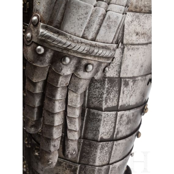 A suit of black and white cavalry armour, assembled from old components, Nuremberg, circa 1560 - 1600