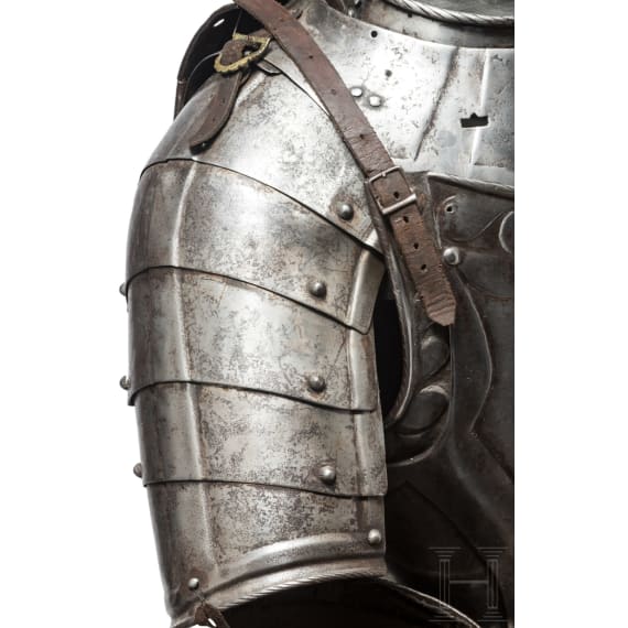 A suit of black and white cavalry armour, assembled from old components, Nuremberg, circa 1560 - 1600