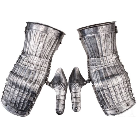 A pair of iron Maximilian gauntlets, circa 1530