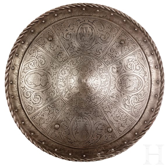 An etched round shield, collector's replica in the style of the 16th century