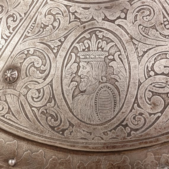 An etched round shield, collector's replica in the style of the 16th century