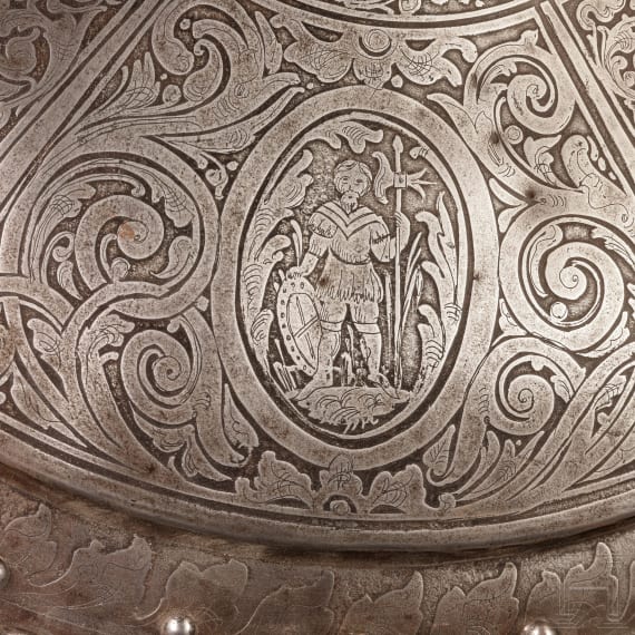 An etched round shield, collector's replica in the style of the 16th century
