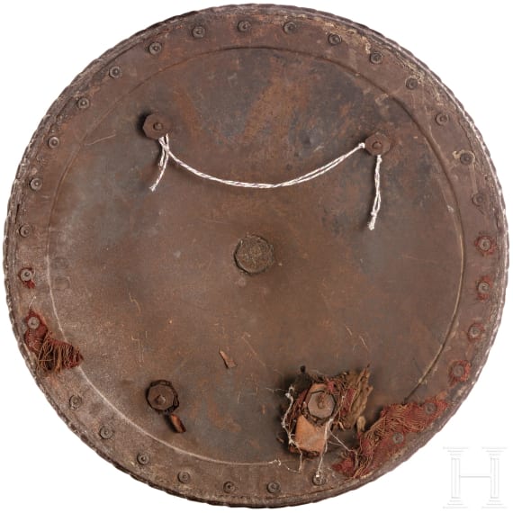 An etched round shield, collector's replica in the style of the 16th century