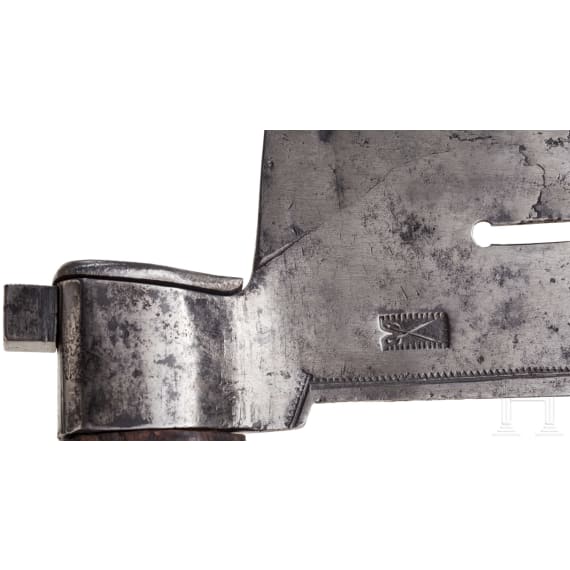 A Saxon miner's axe, dated 1686