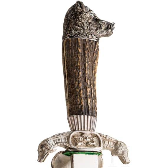 An Austro-Hungarian hunting hanger, bandolier and epaulettes worn by a count's high-ranking forestry official, circa 1910