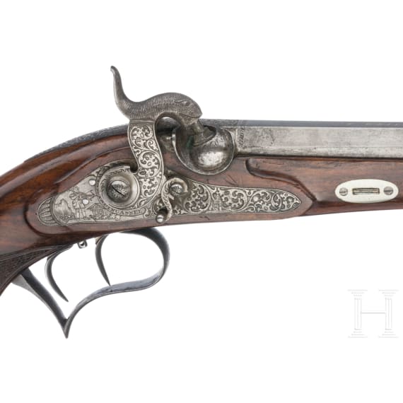 Ein Paar Perkussionspistolen mit gravierter Tell-Legende im Kasten, F. Weiland in Kassel, um 1840/50