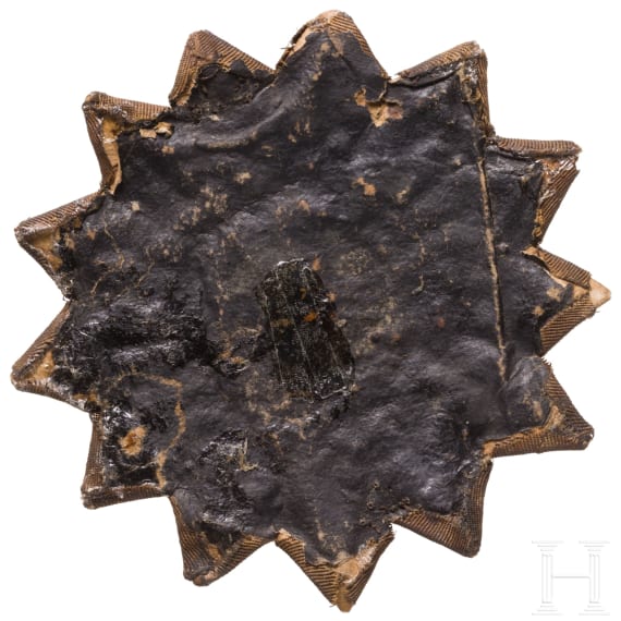 An embroidered fabric star with phoenix, 19th/20th century