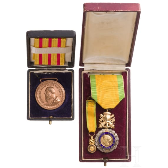 A cased French and Baden medal